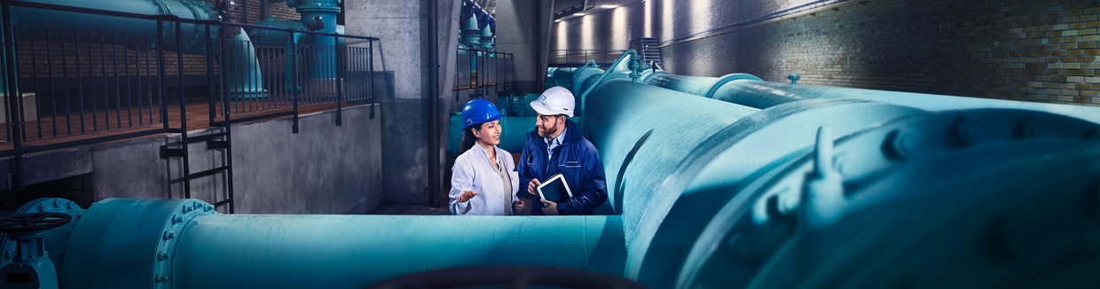 Engineer in front of a wastewater plant