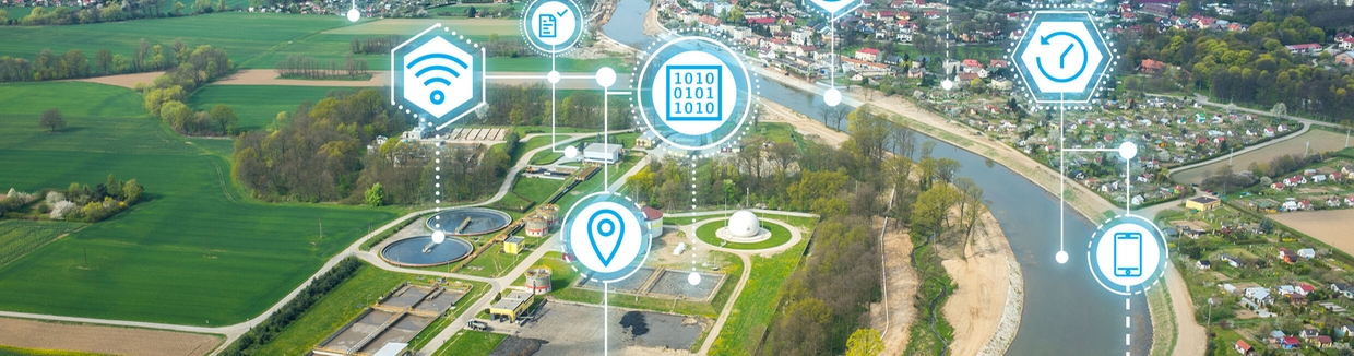 Dashboard of Netilion Water Network Insights in front of a water reservoir